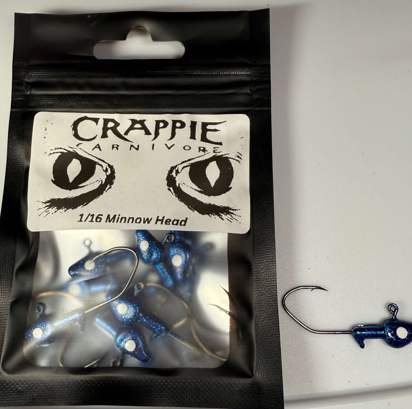 Blue sapphire minnow jig head pack with sickle style hooks, perfect for crappie fishing, 1/16oz size.