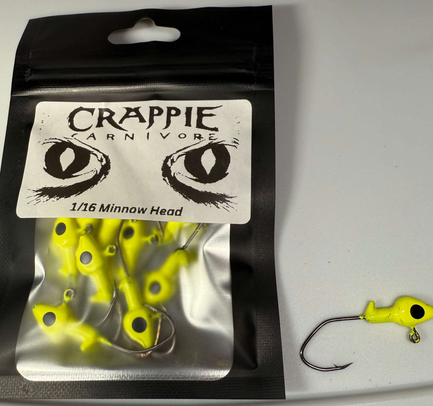 Minnow jig head pack in chartreuse color, 1/16oz size, featuring sickle style hook #2 for fishing enthusiasts.