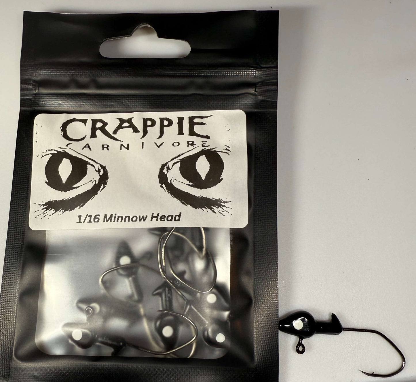 Minnow Jig Head pack, 10/pack, black color, 1/16oz with sickle style hook #2, ideal for fishing enthusiasts.